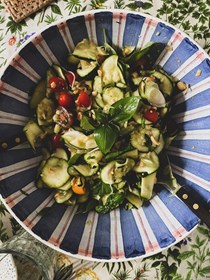 Zucchini salad with tomatoes, peanuts, basil, mint and spicy fish-sauce sauce
