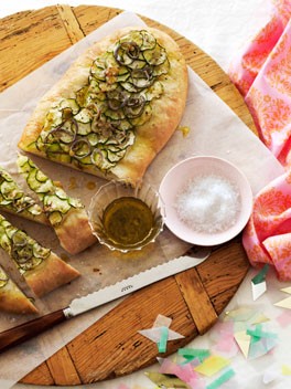Zucchini schiacciata with green garlic oil